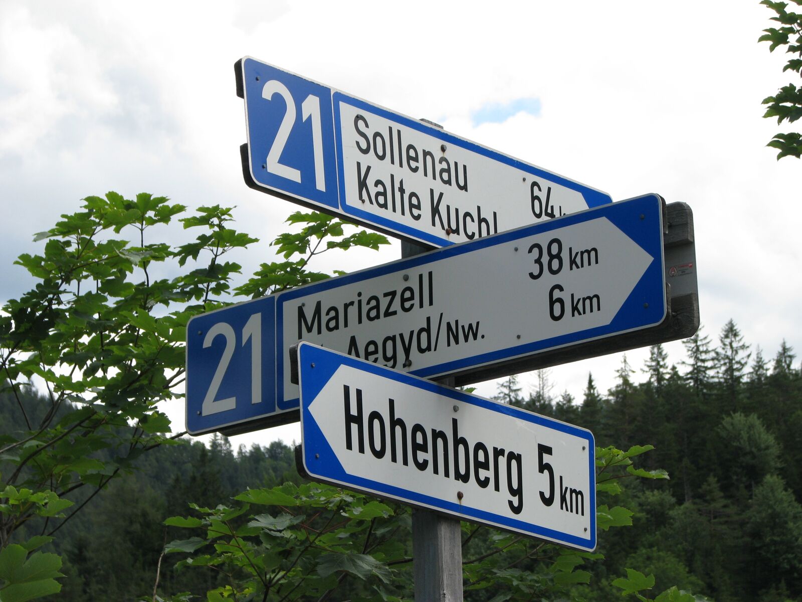 Canon POWERSHOT S5 IS sample photo. Road sign, mountain, direction photography