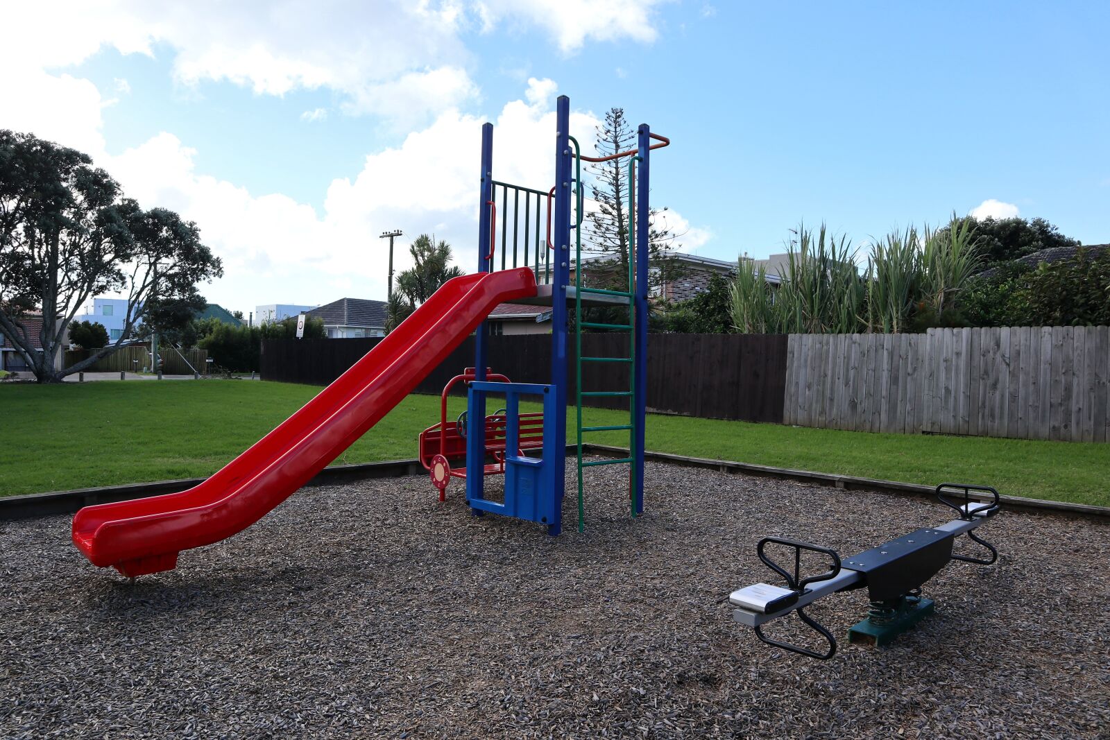 Canon EOS M100 sample photo. Playground, slide, outdoors photography