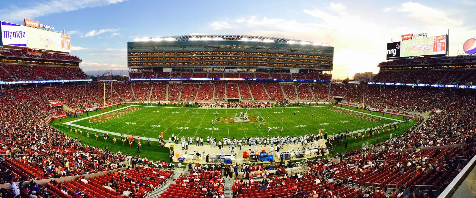 iPhone 6 Plus back camera 4.15mm f/2.2 sample photo. Athletes, stadium, crowd photography