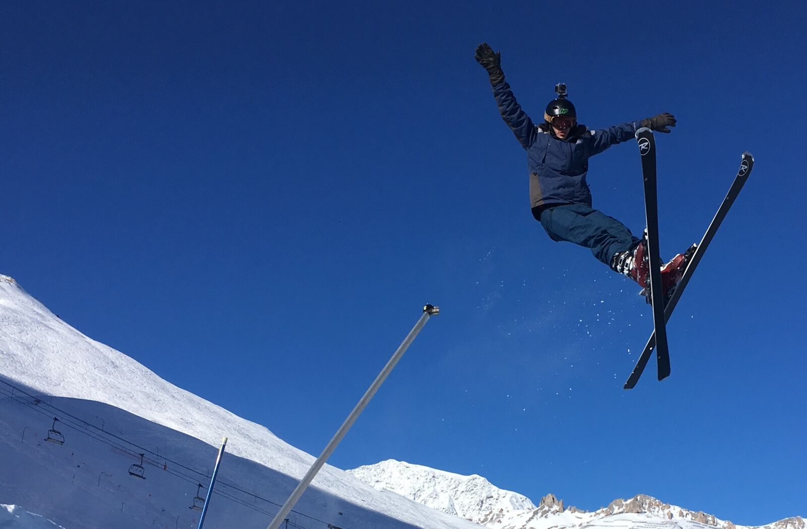 iPhone SE back camera 4.15mm f/2.2 sample photo. Ski, jump, snow photography