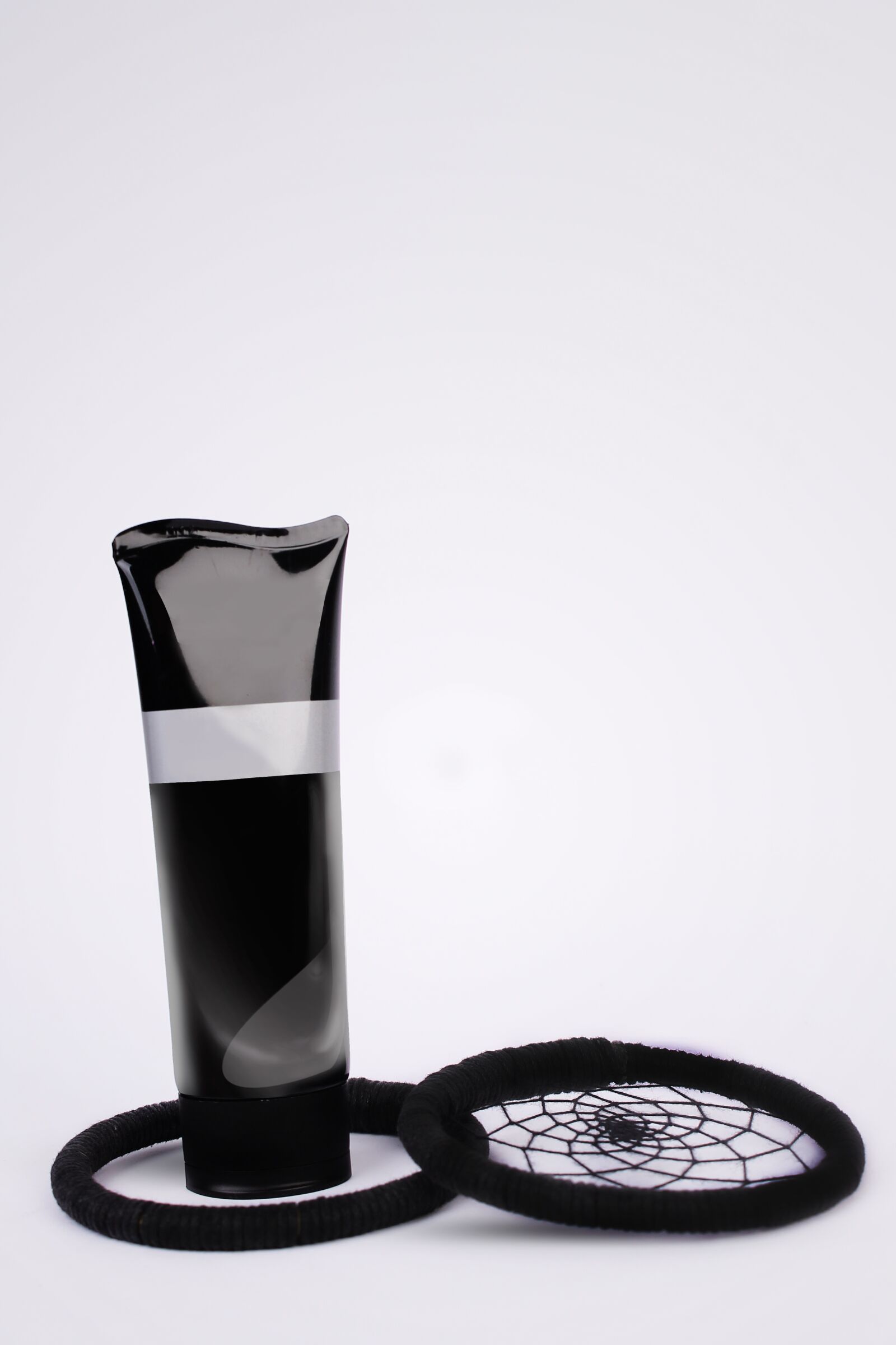 Canon EOS 1100D (EOS Rebel T3 / EOS Kiss X50) sample photo. Black, plastic, packaging photography