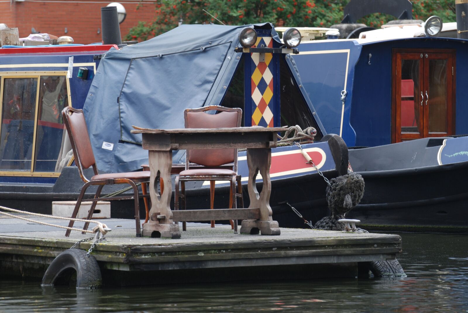 Nikon D80 sample photo. Chairs, pier, water photography