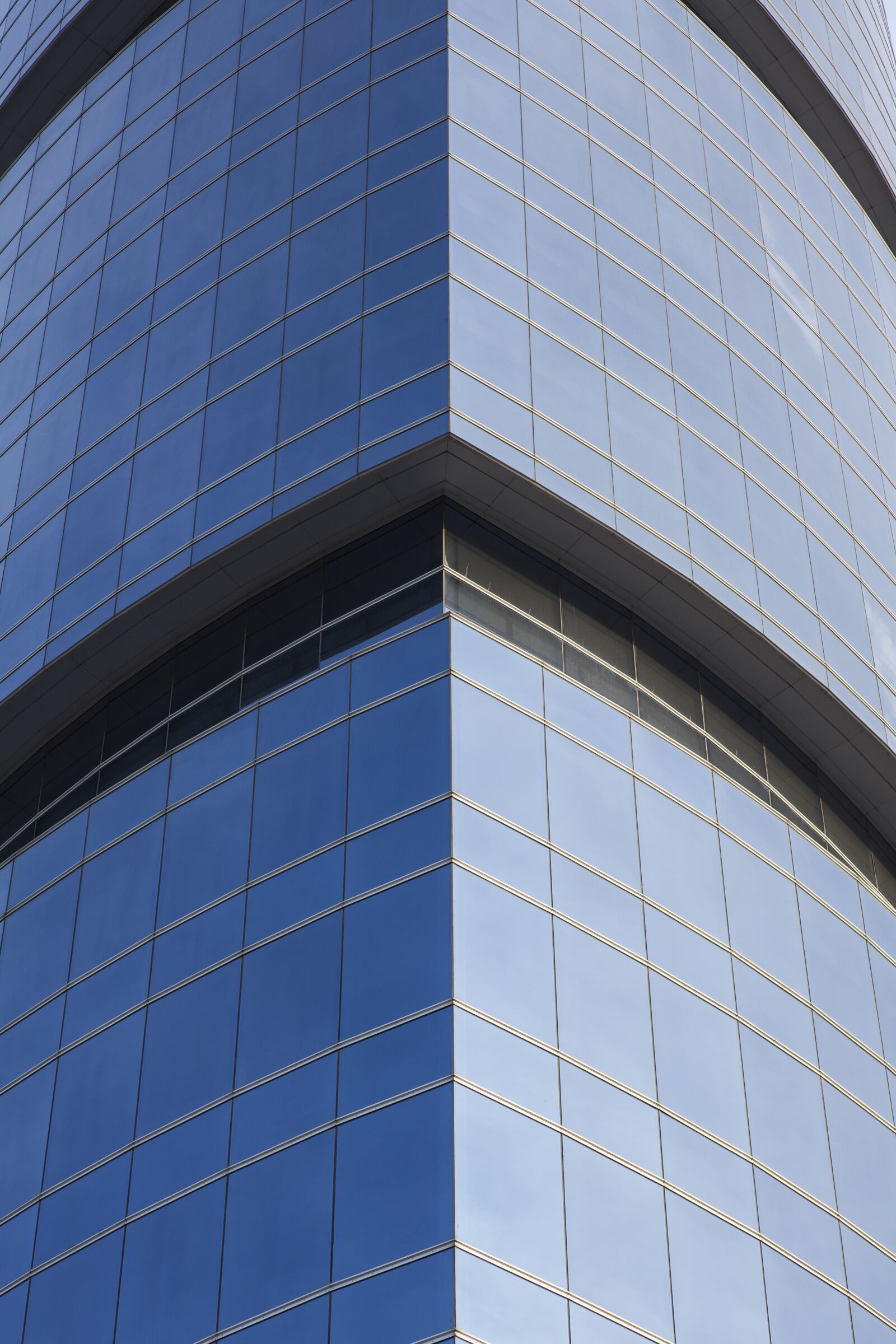 ZEISS Planar T* 85mm F1.4 sample photo. Glass, building, office photography