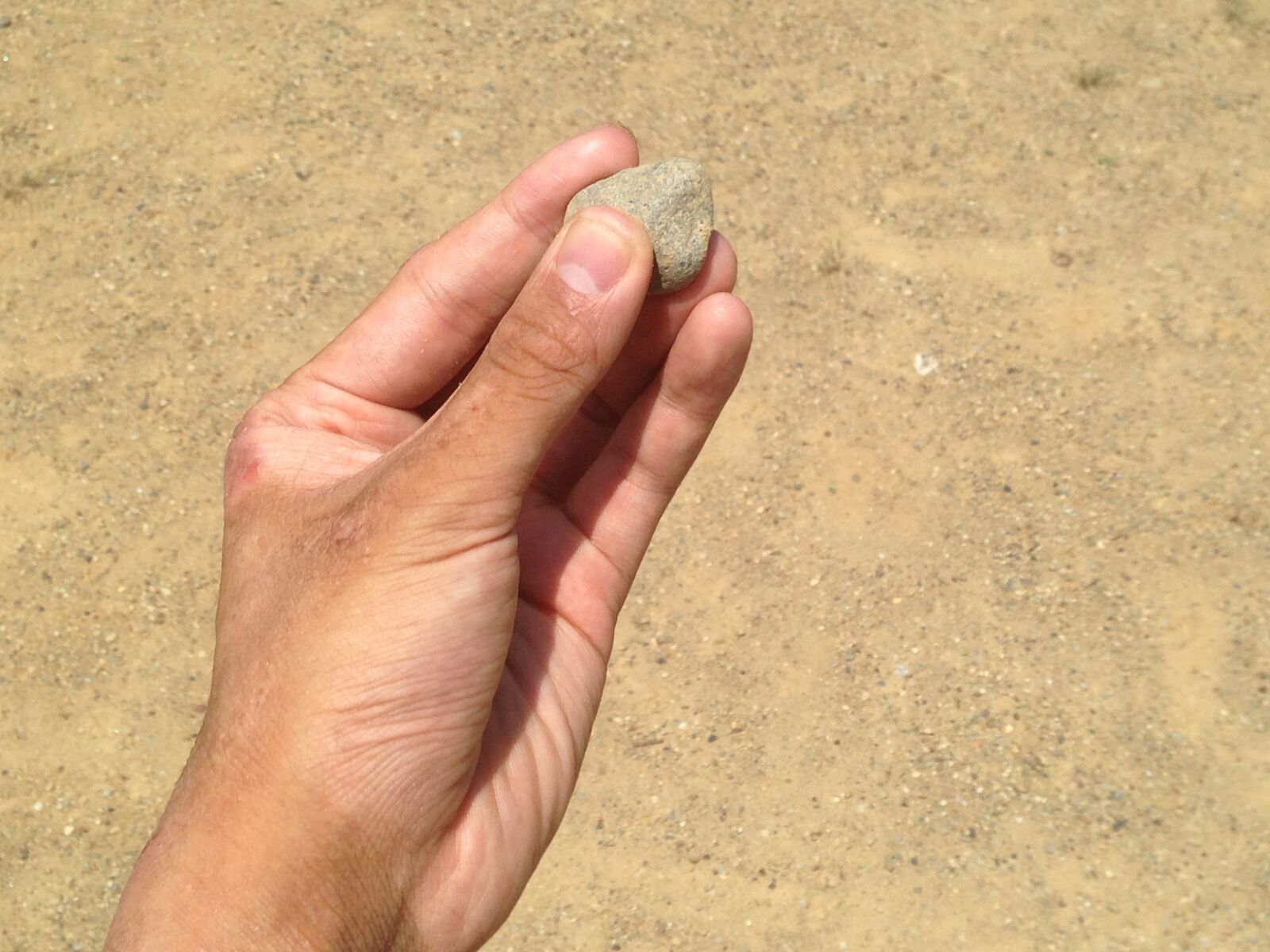 iPhone 5 back camera 4.12mm f/2.4 sample photo. Hand, nail, stone photography