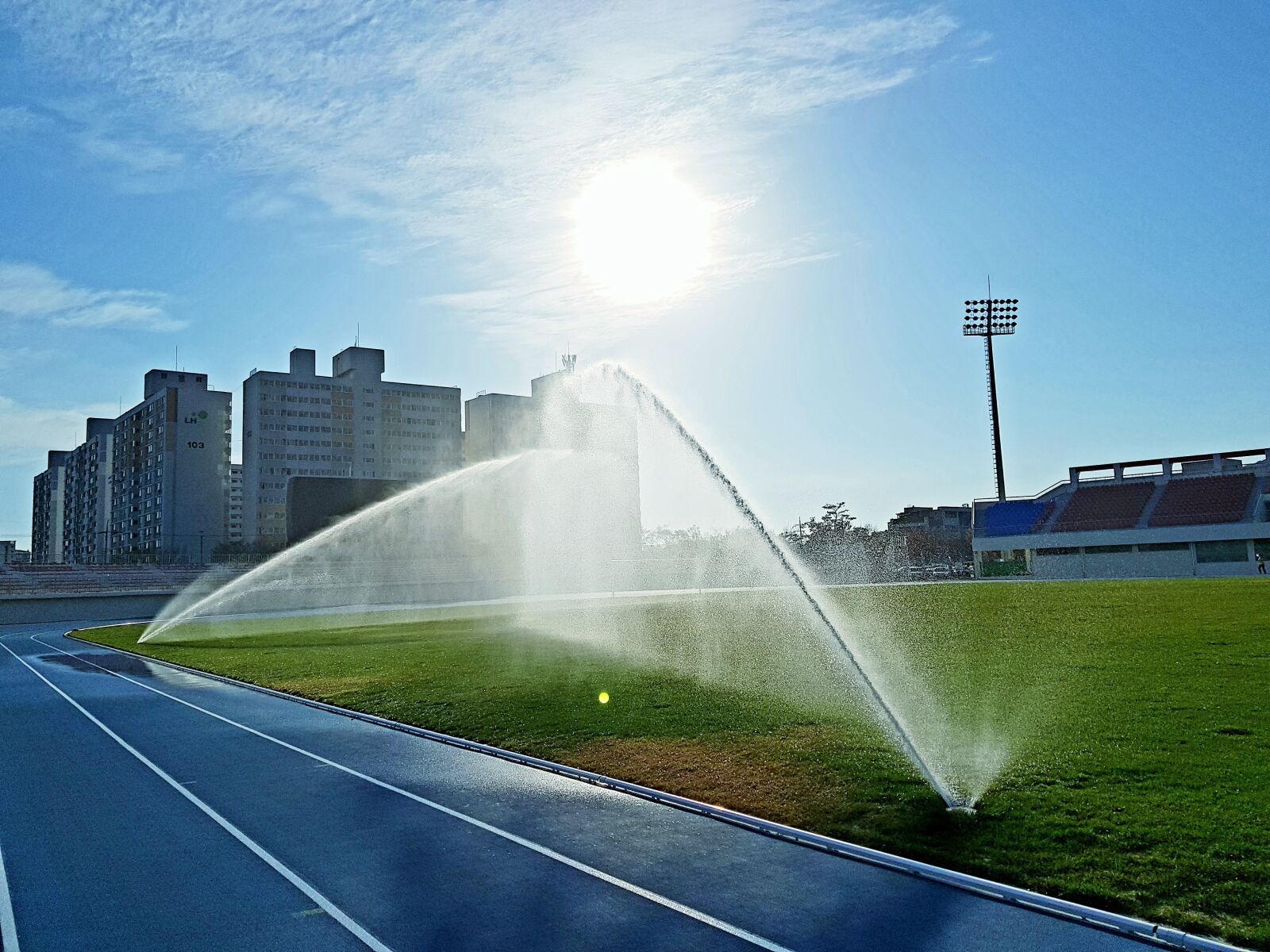 Samsung Galaxy S8 sample photo. Rainbow, public playground, sprinkler photography