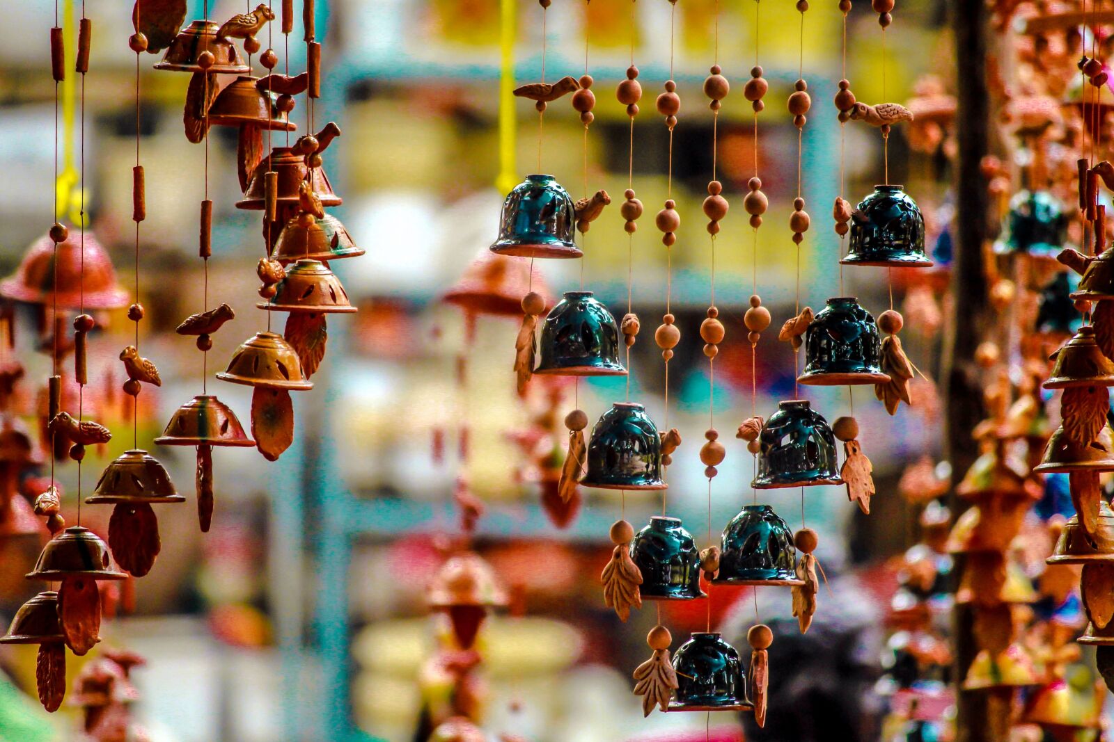 Canon EF-S 55-250mm F4-5.6 IS II sample photo. Bazaar, bells, carvings, celebration photography