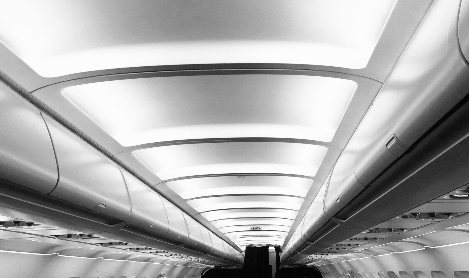 Apple iPhone 6 sample photo. Cabin, airplane, people photography