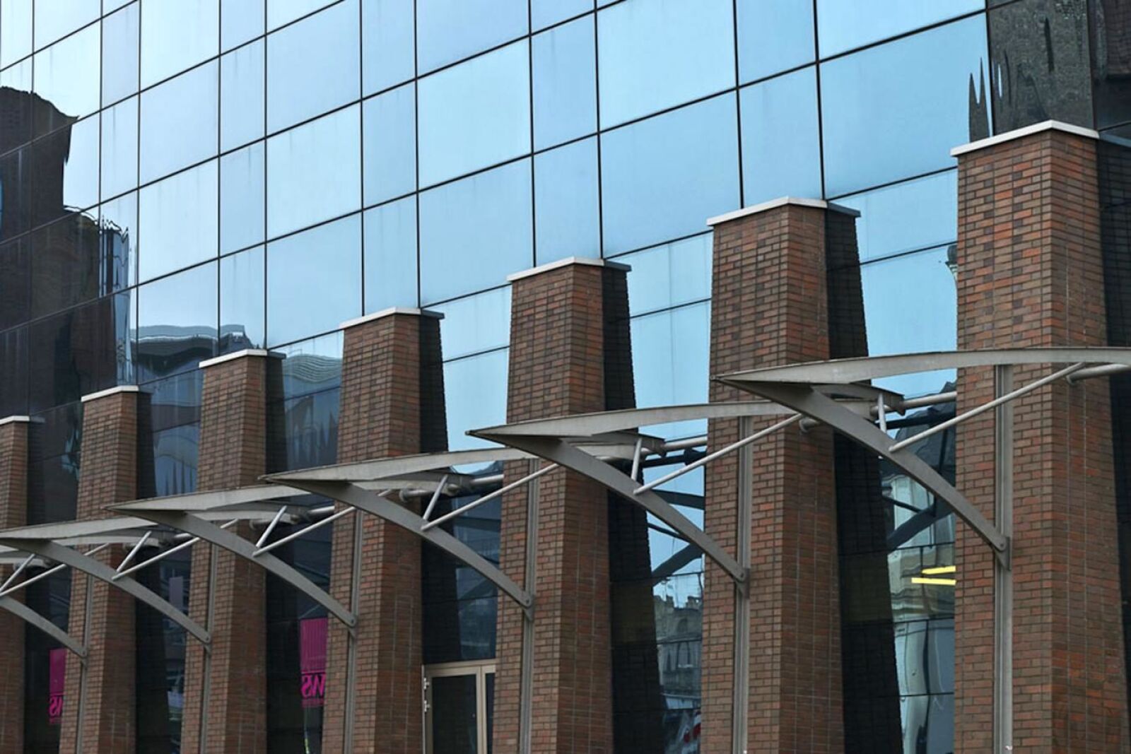 Nikon D3100 sample photo. Glass, steel, facade, modern photography