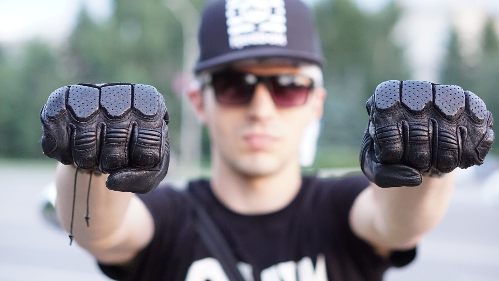 E 50mm F1.8 OSS sample photo. Biker, motorcycle, biker gloves photography