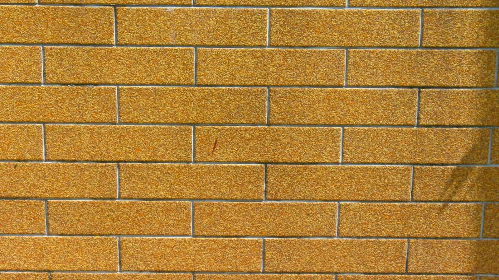 Olympus VG110,D700 sample photo. Brick wall, cement, cube photography