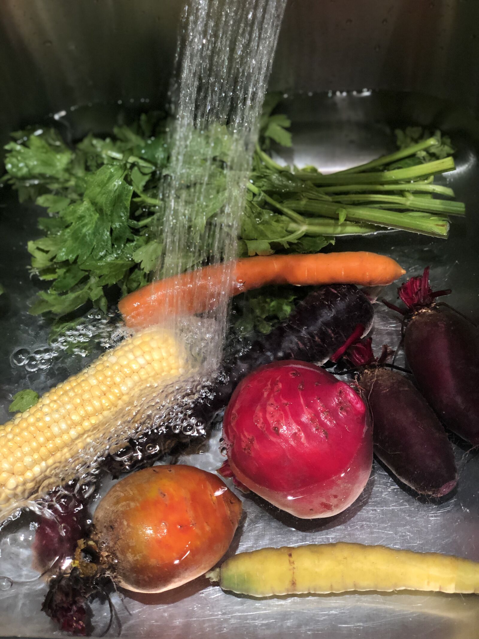 Apple iPhone X sample photo. Washing vegetables, fresh produce photography