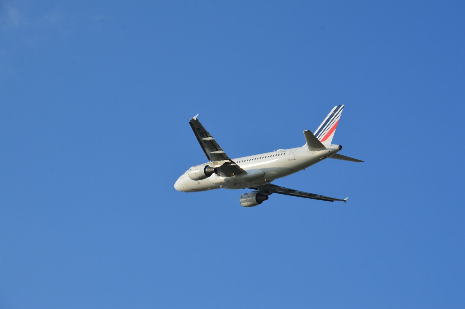 Nikon D3200 sample photo. A plane, sky, clouds photography