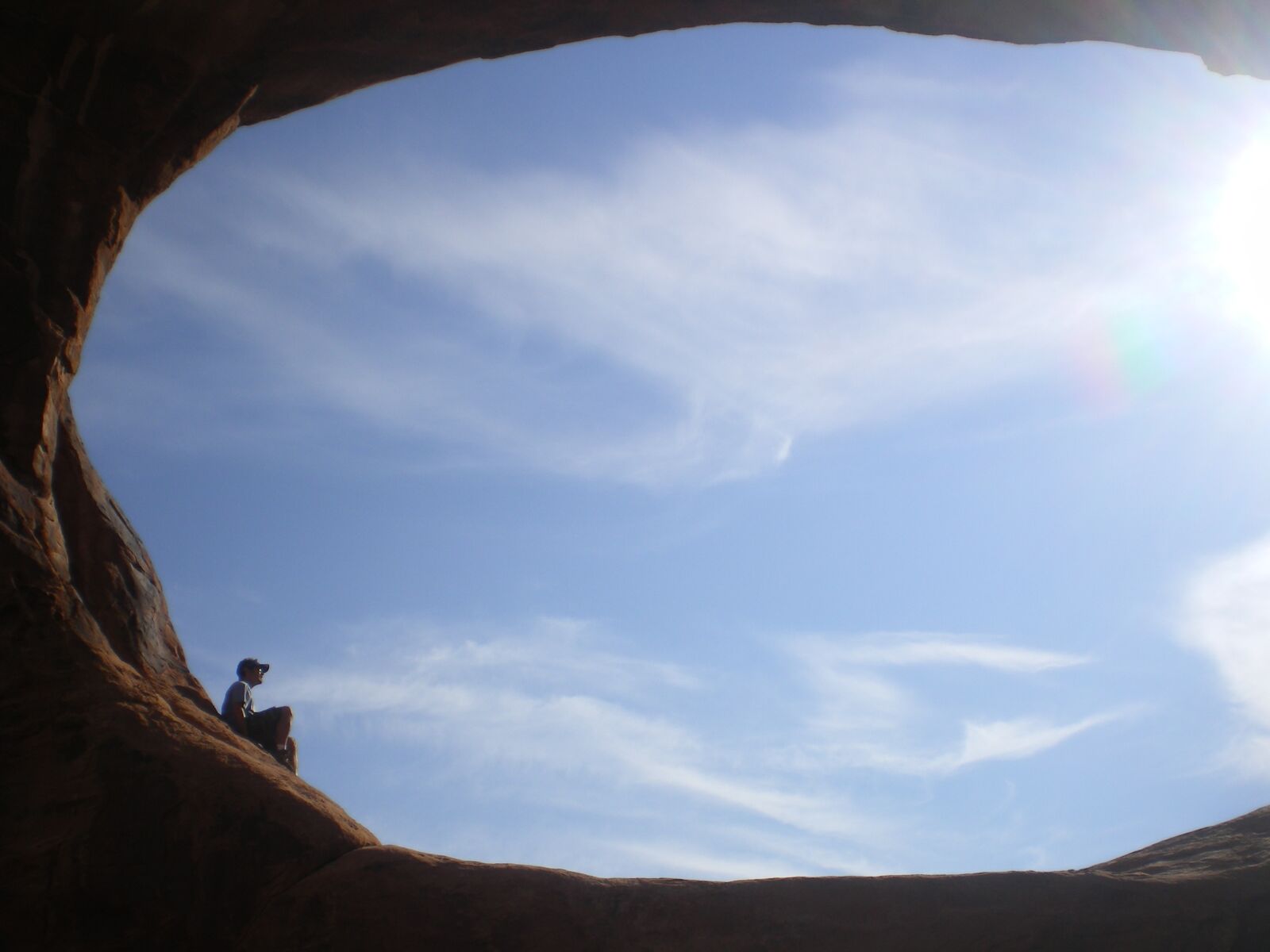 Pentax OPTIO M20 sample photo. Rock, clouds, sky photography