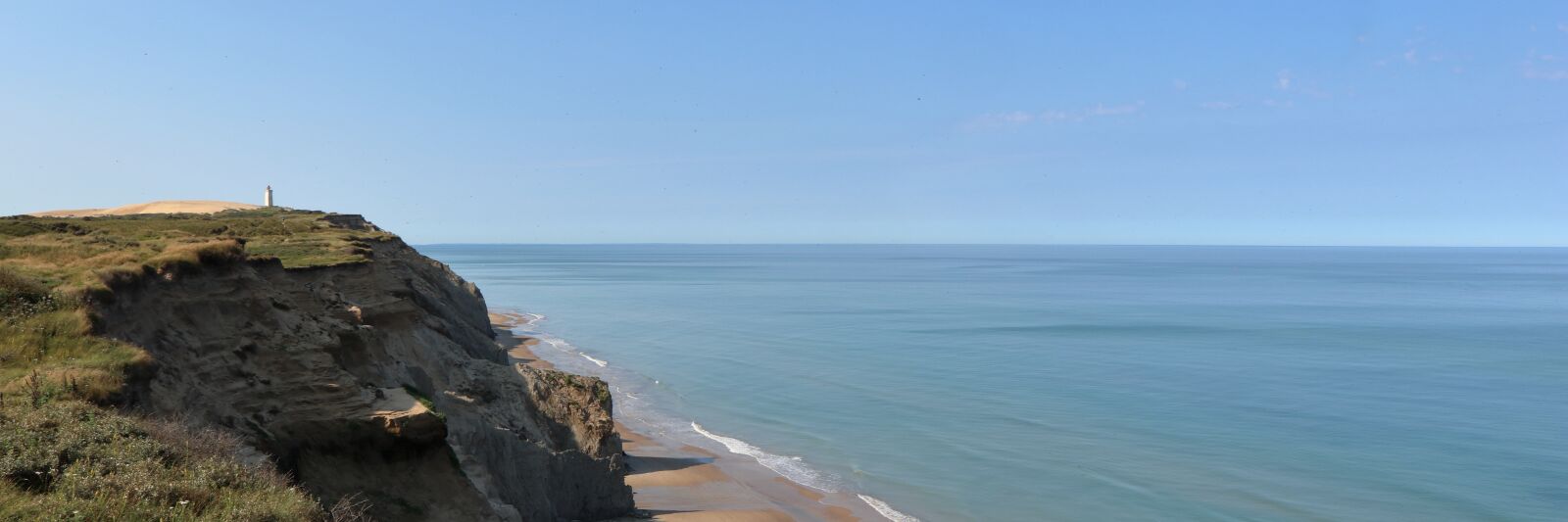 Canon EF-S 18-135mm F3.5-5.6 IS USM sample photo. Guy, sea, beach photography