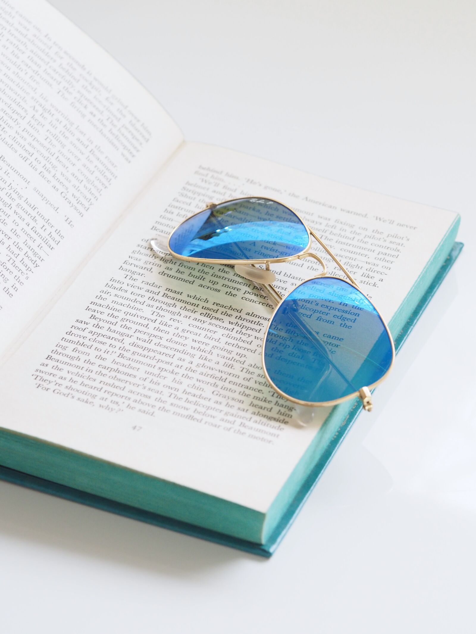 Olympus M.Zuiko Digital ED 60mm F2.8 Macro sample photo. Summer, sunglasses, book photography