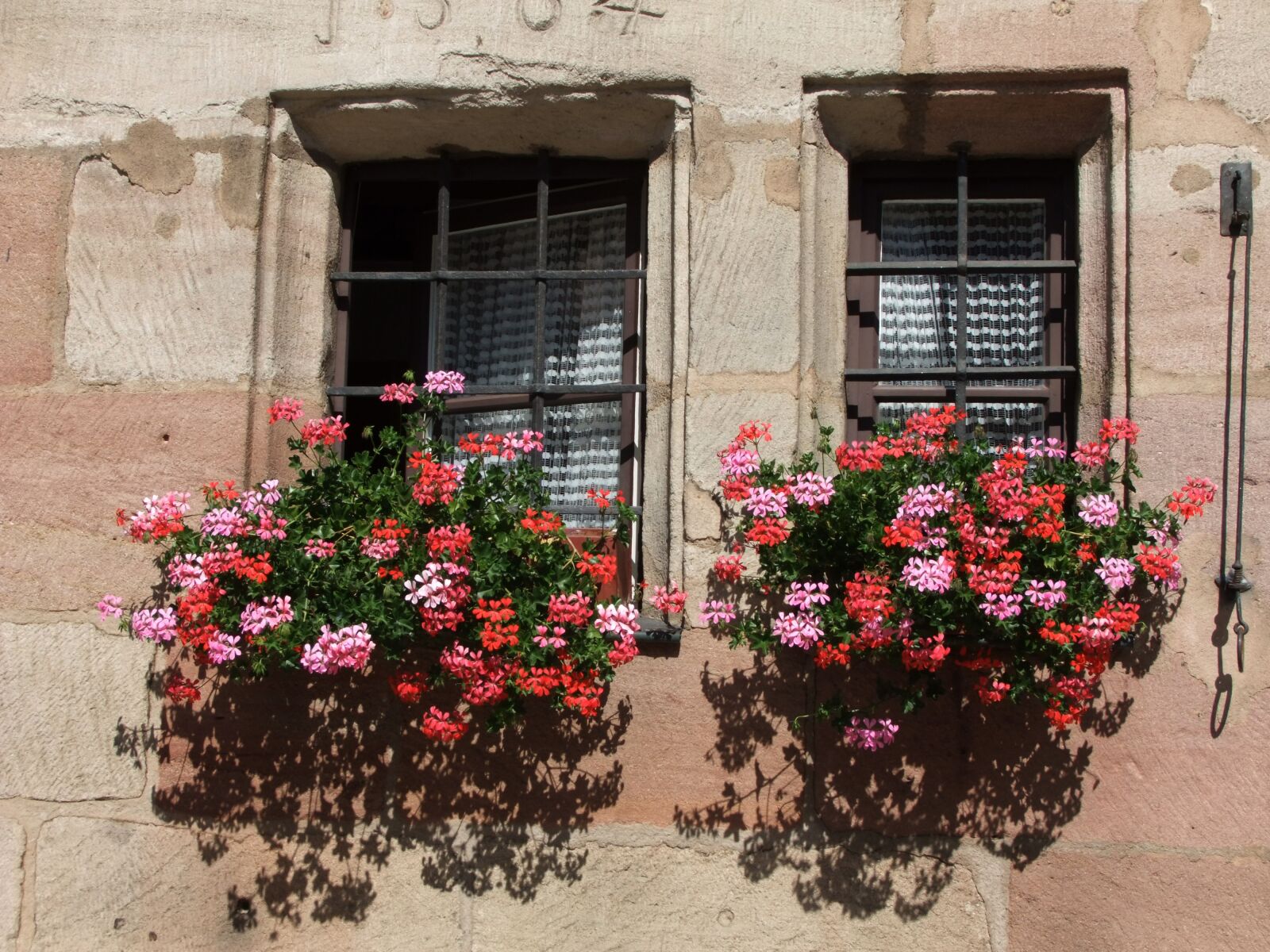 FujiFilm FinePix S200EXR (FinePix S205EXR) sample photo. Flower boxes, window, facade photography