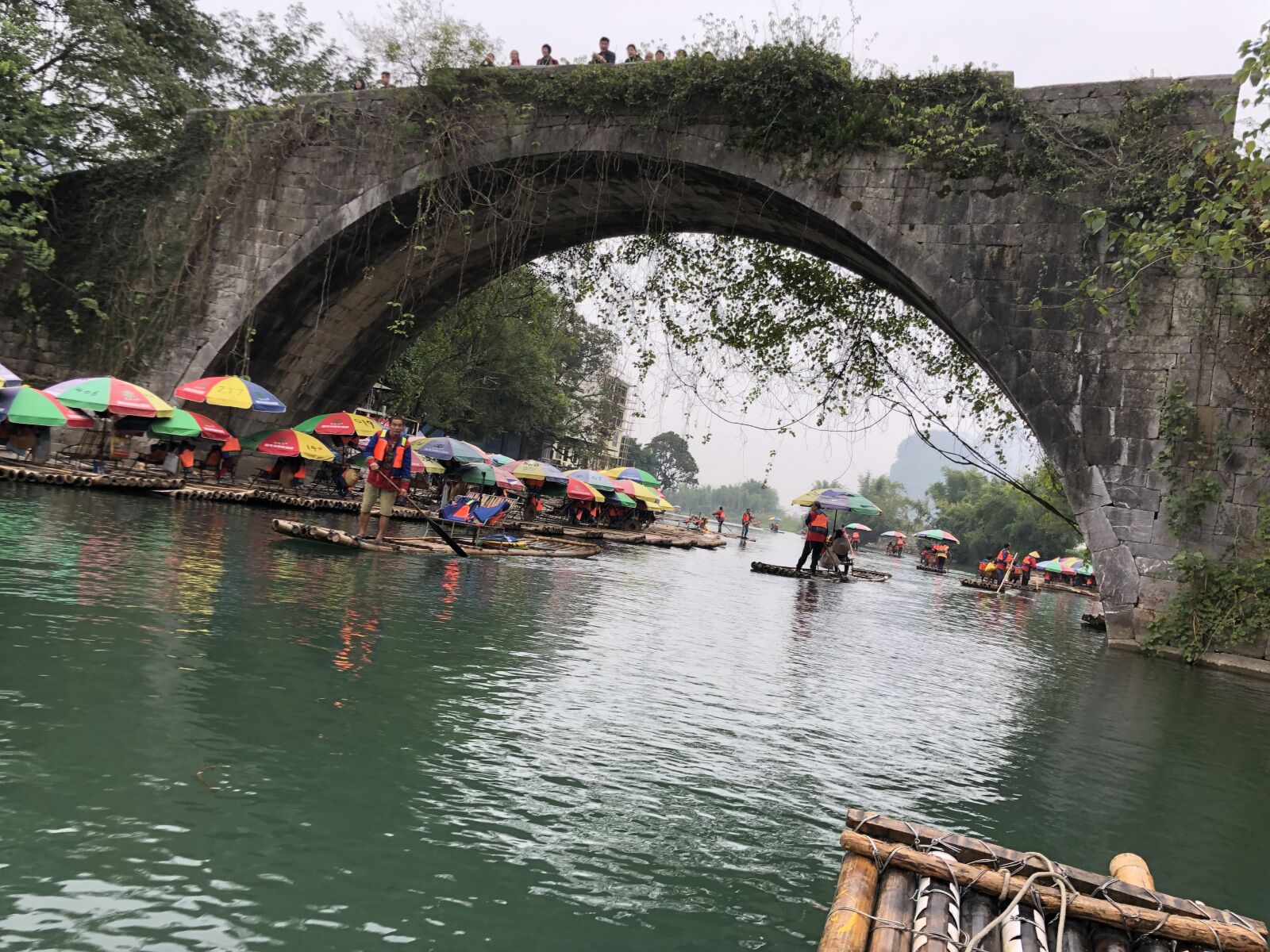 iPhone X back dual camera 4mm f/1.8 sample photo. Arches, bridge, crowd, ecotourism photography