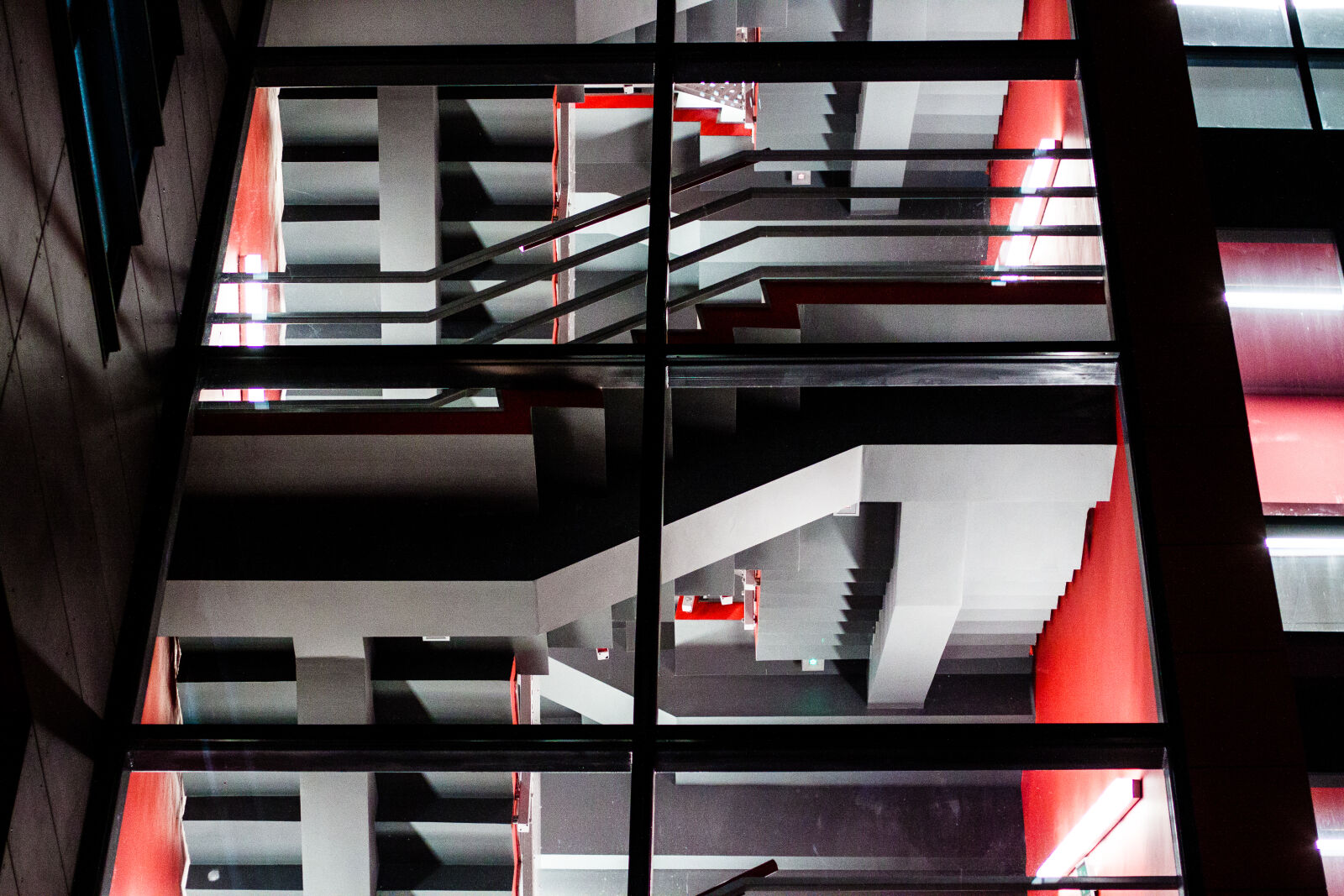 Canon EOS 50D + Canon EF 50mm F1.4 USM sample photo. Gray, red, staircase, stairs photography