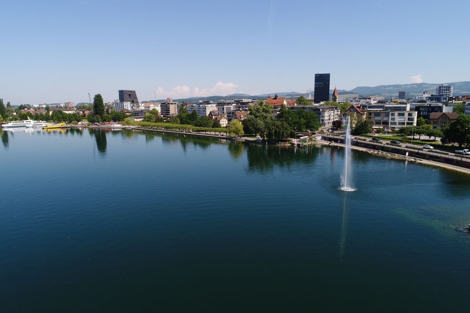 DJI FC6310 sample photo. Train, lake, fountain photography