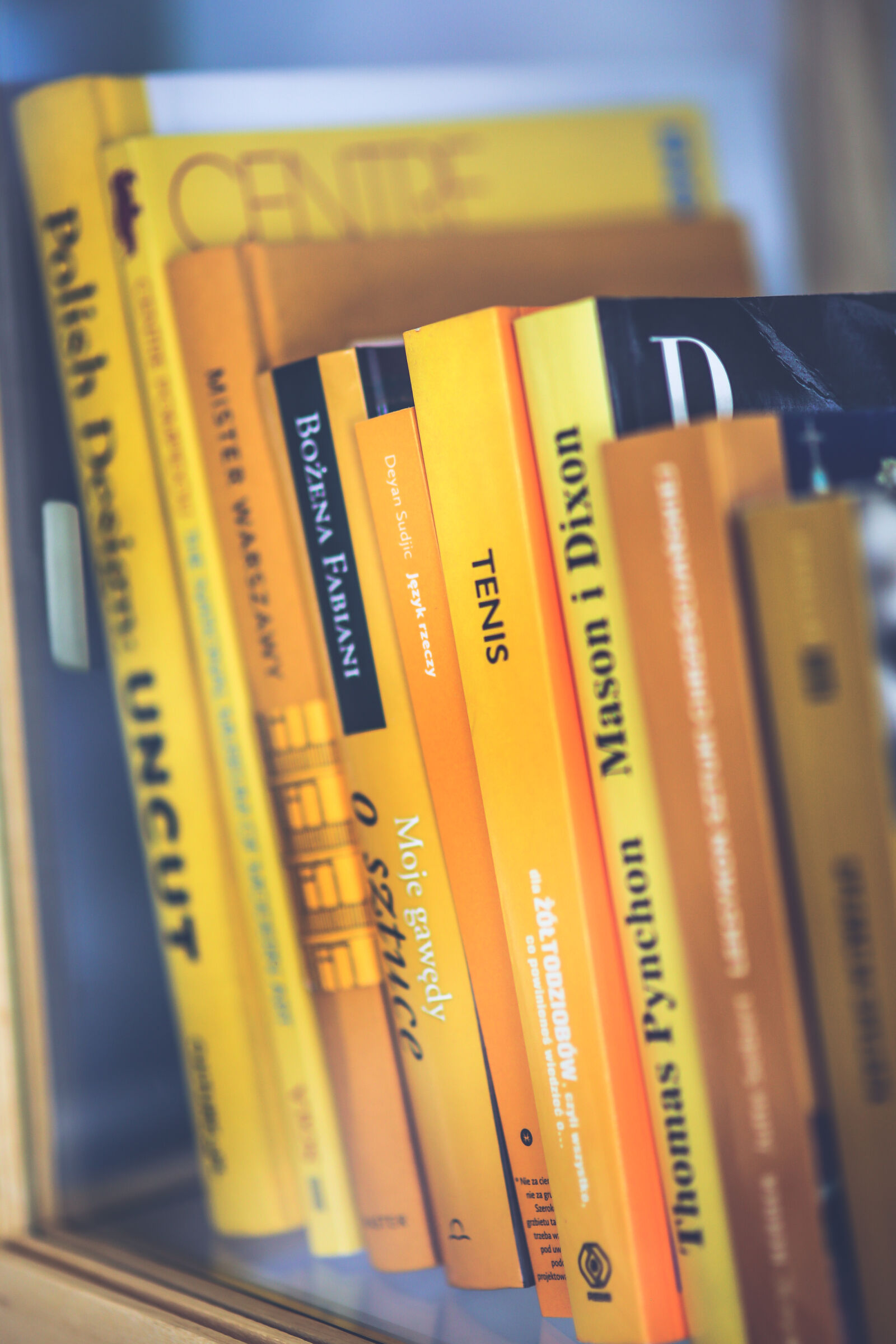 Sigma 85mm F1.4 EX DG HSM sample photo. Only, yellow, books photography