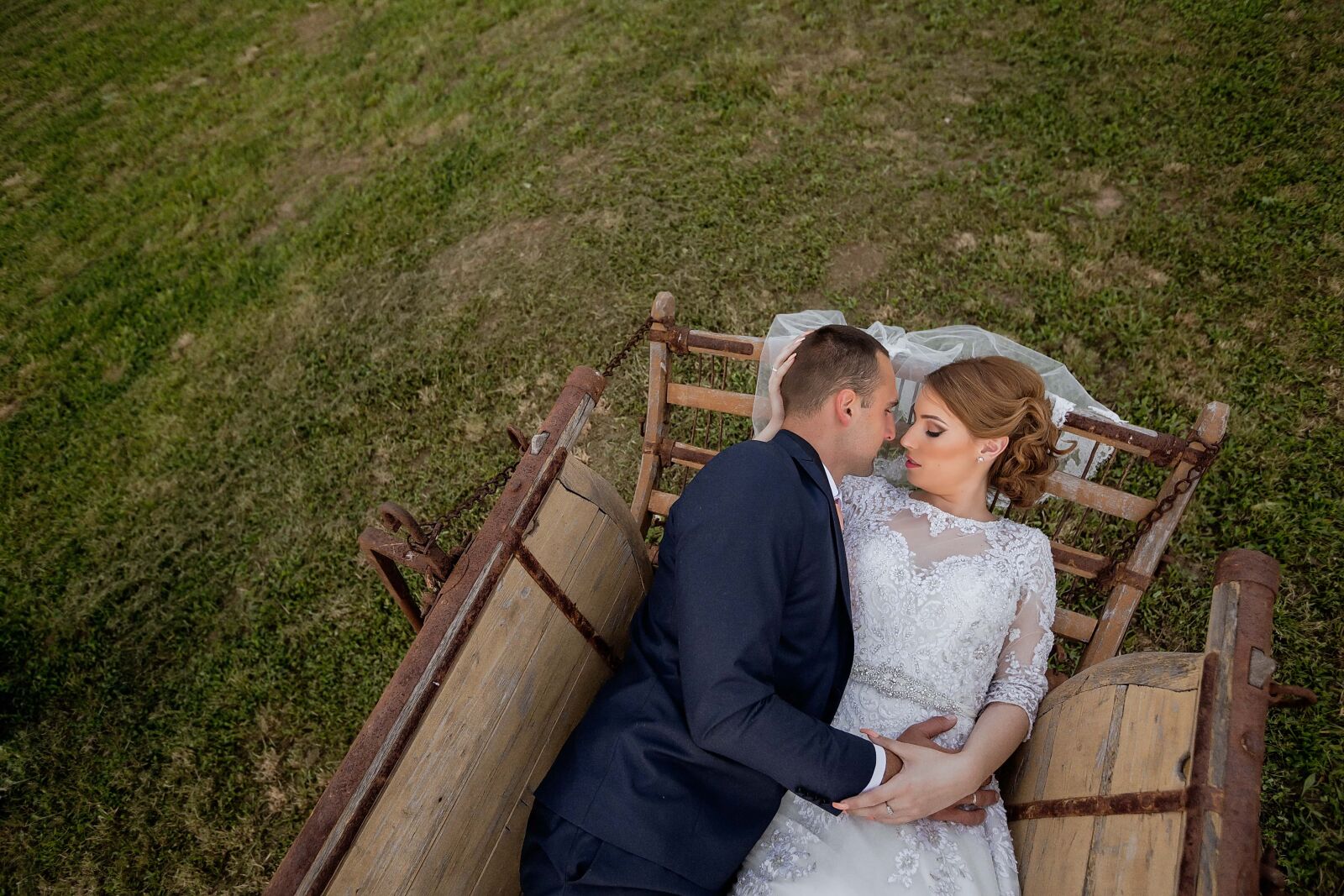 Canon EOS 5D Mark III + Canon EF 16-35mm F2.8L II USM sample photo. Bride, laying, groom, carriage photography