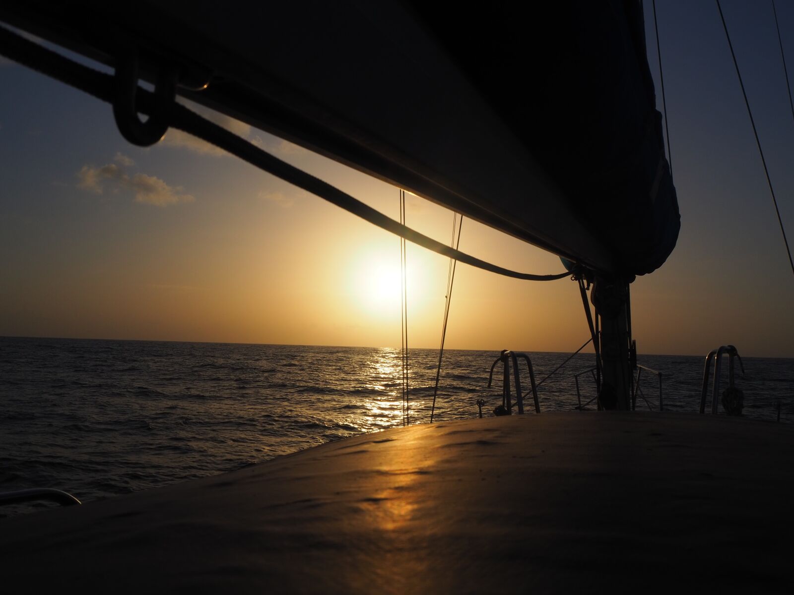 Olympus PEN E-PL9 sample photo. Sailboat, deck chair, sea photography
