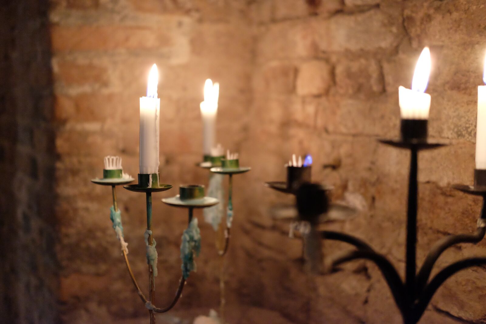 Fujifilm X-T1 + Fujifilm XF 35mm F2 R WR sample photo. Candles, tea lights, brick photography