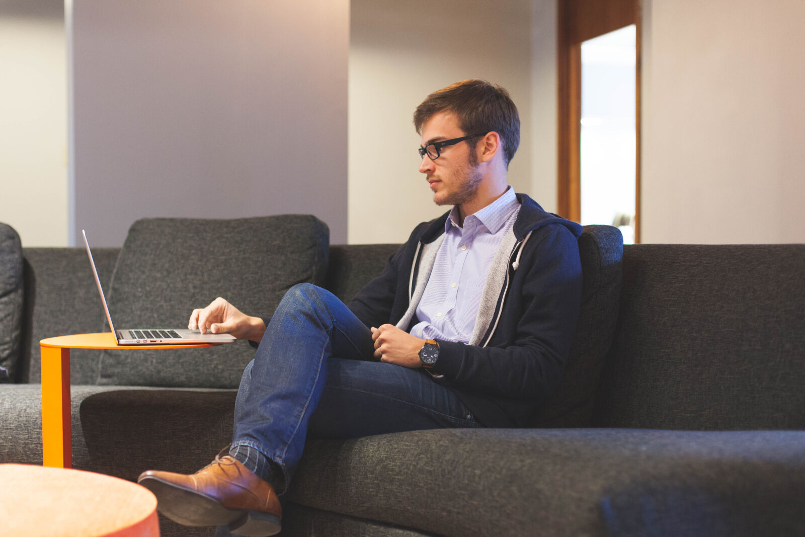 Canon EOS 5D Mark II sample photo. Man, couch, working, laptop photography