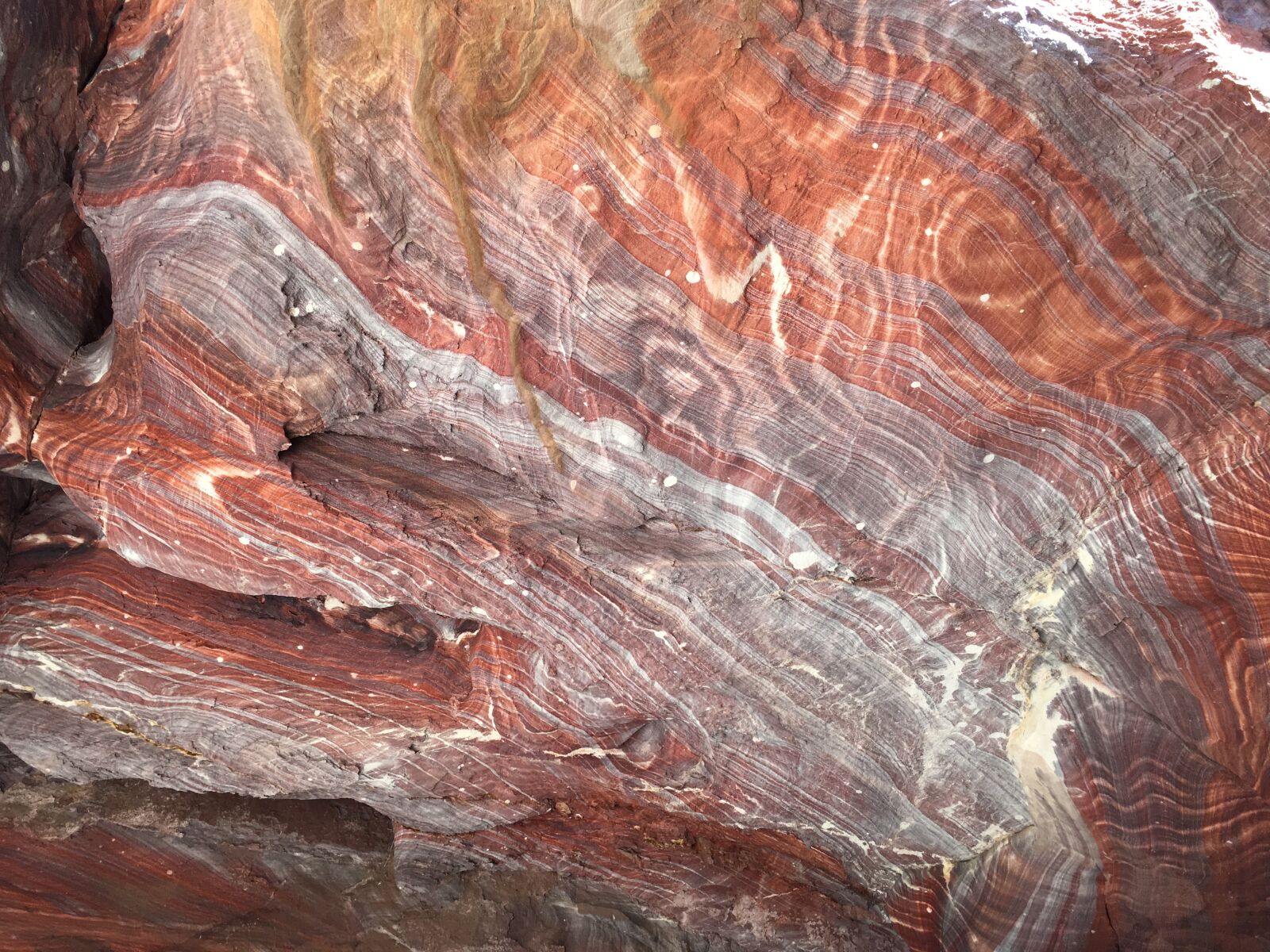 iPhone SE back camera 4.15mm f/2.2 sample photo. Coloured, cave, coloured, rocks photography
