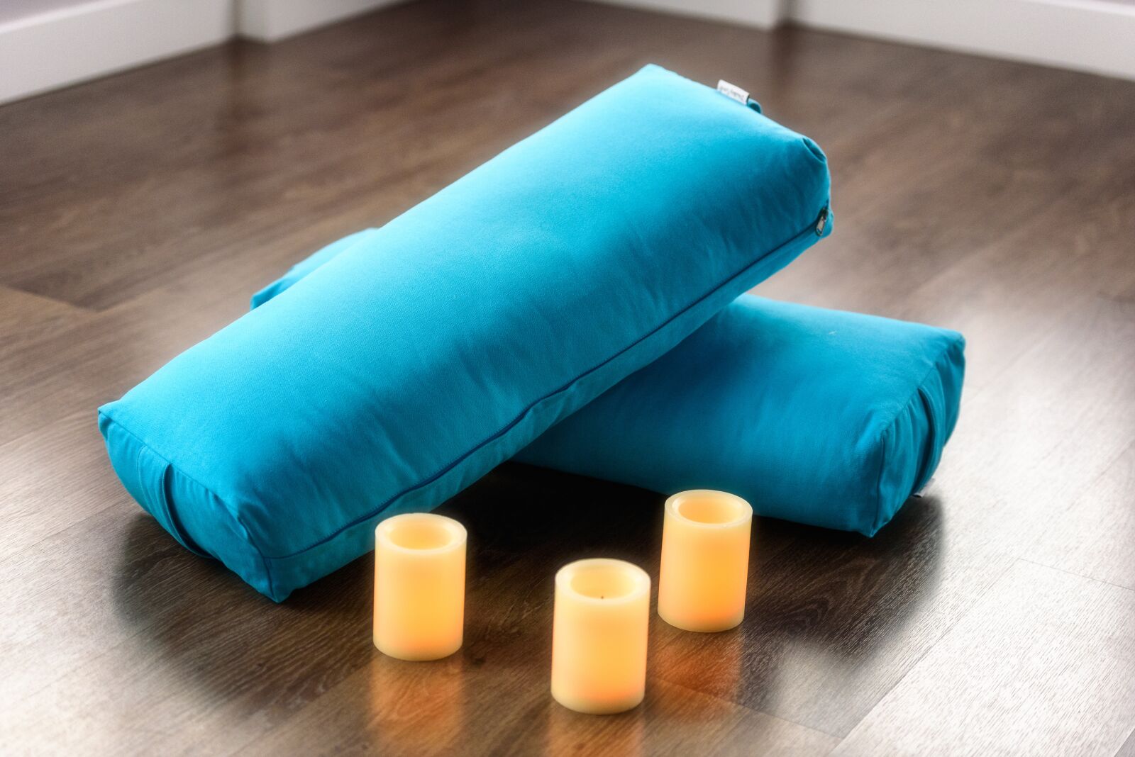 Nikon D750 sample photo. Yoga, bolster, candle photography
