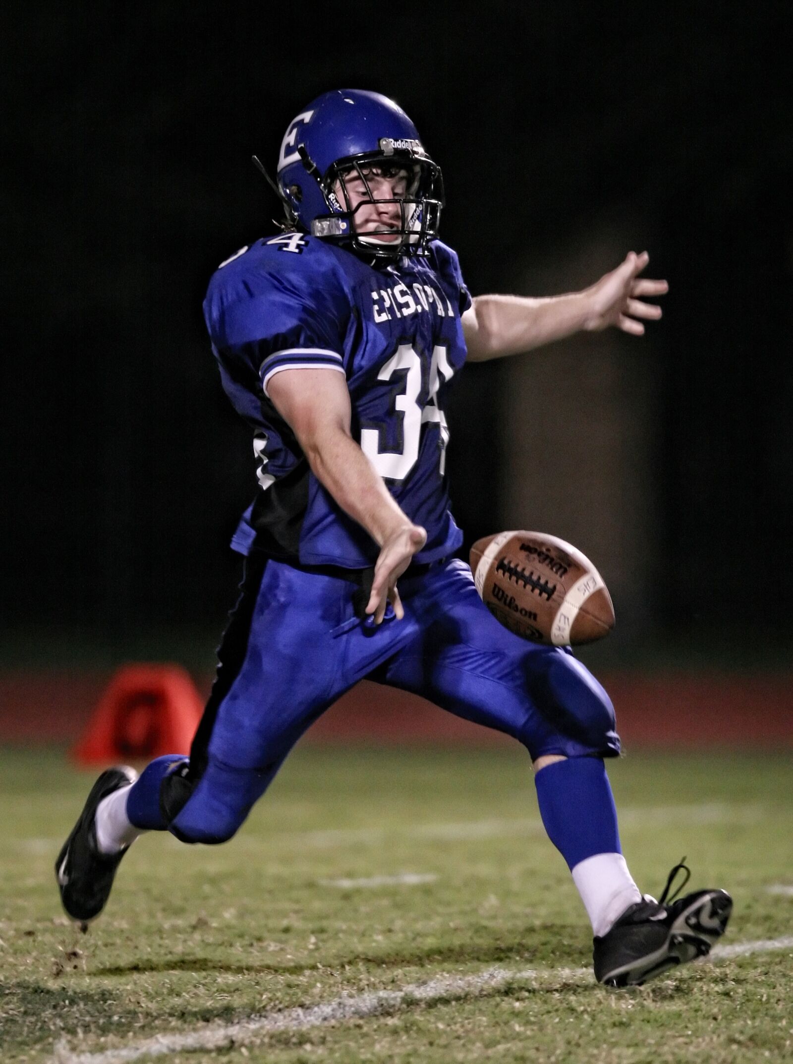 Canon EOS 20D sample photo. American football, punter, punt photography