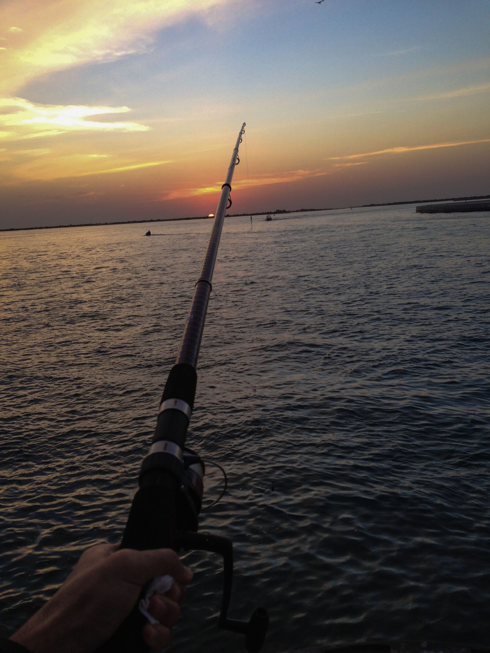 iPhone 5 back camera 4.12mm f/2.4 sample photo. People, fishing, on, sea photography