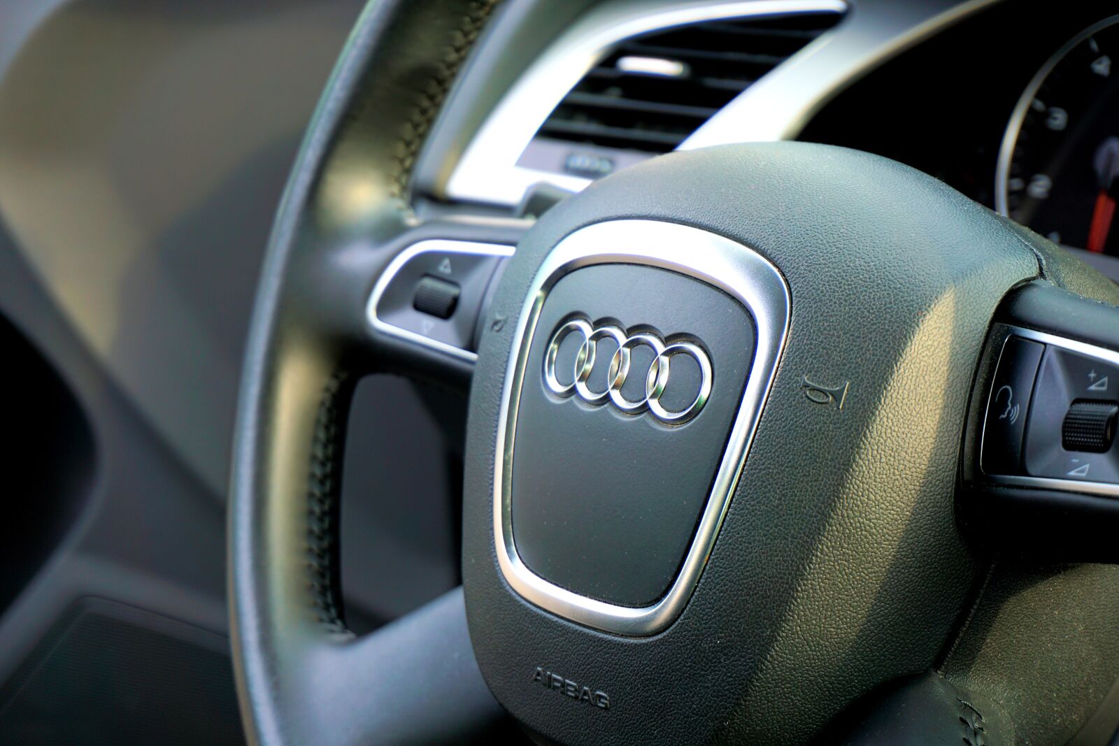 Sony a6000 sample photo. Audi, steering wheel, cockpit photography
