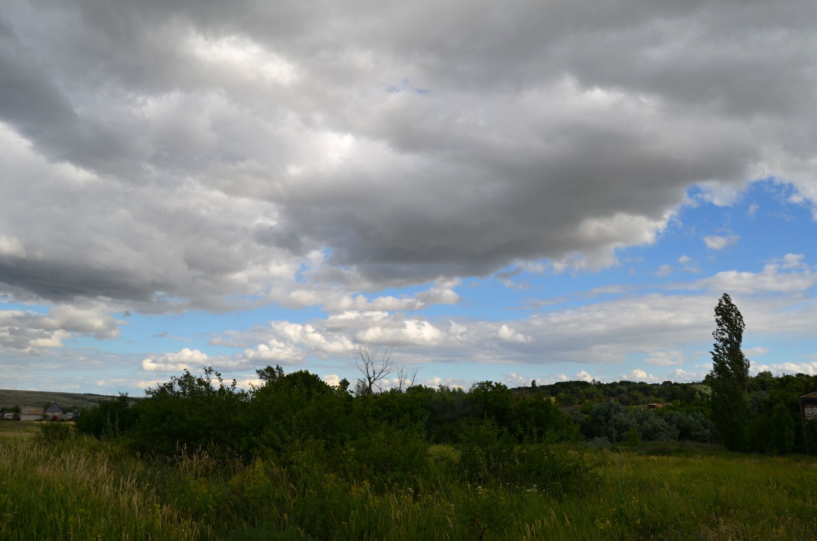 Nikon D5100 sample photo. Sky, village, landscape photography