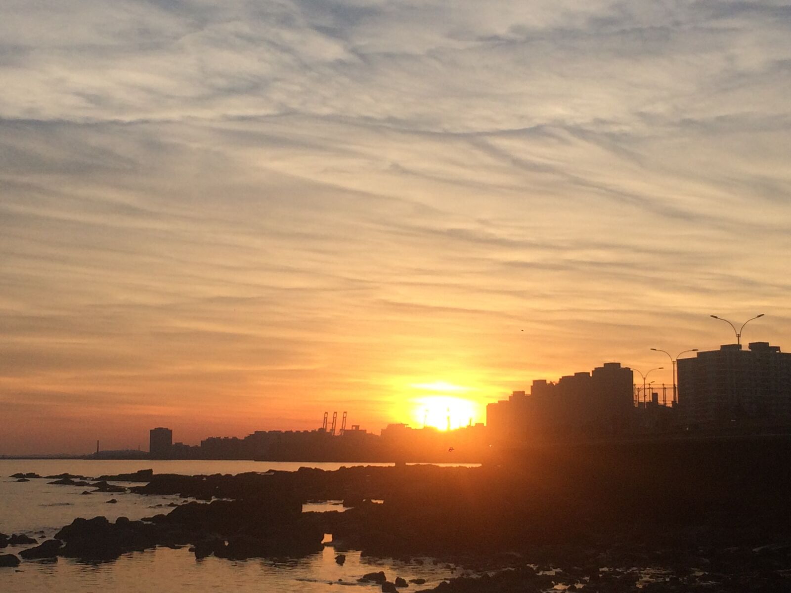 iPhone 5s back camera 4.15mm f/2.2 sample photo. Sunset, sun, uruguay photography