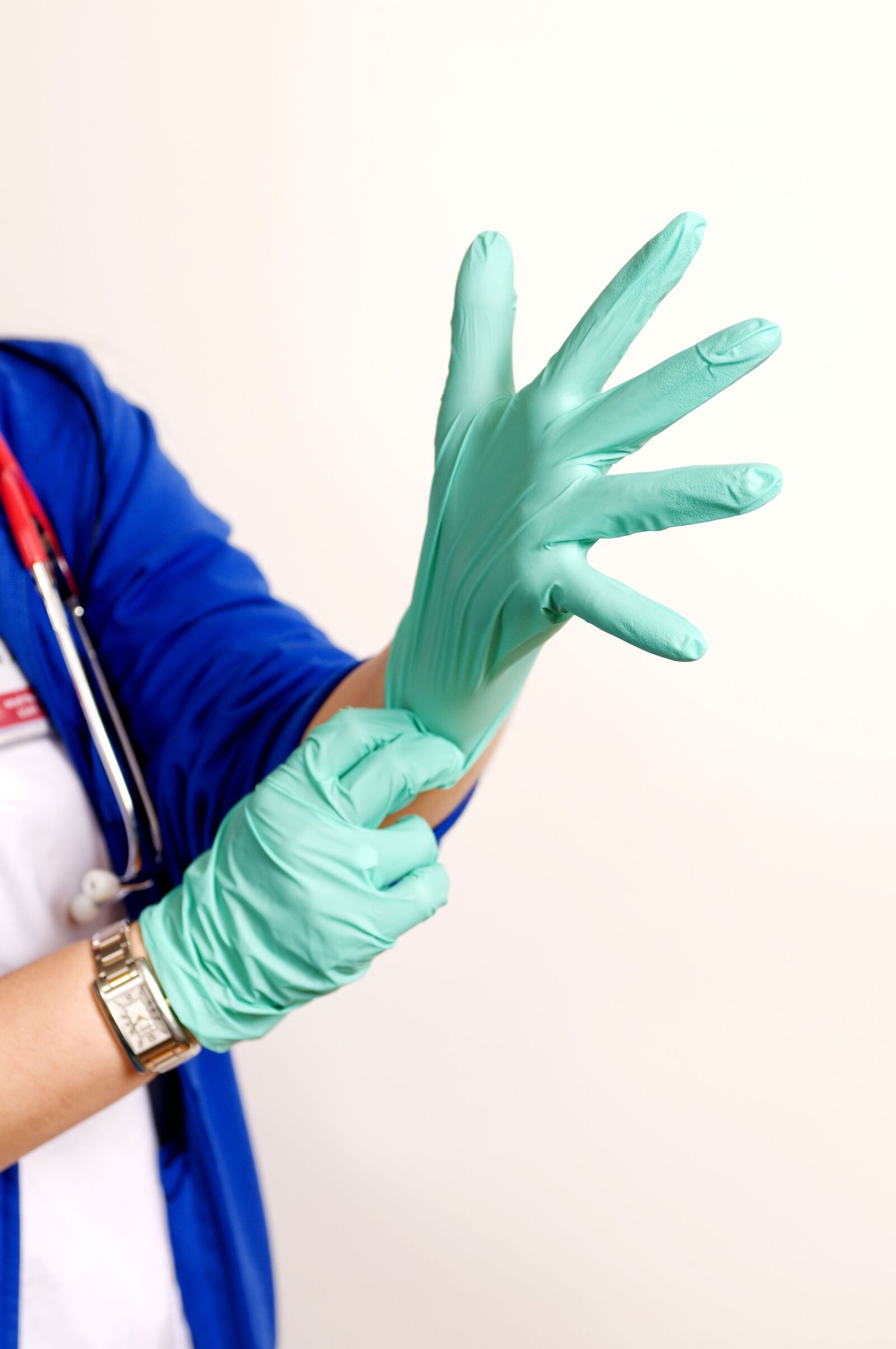 Nikon D300 sample photo. Pair, green latex gloves photography