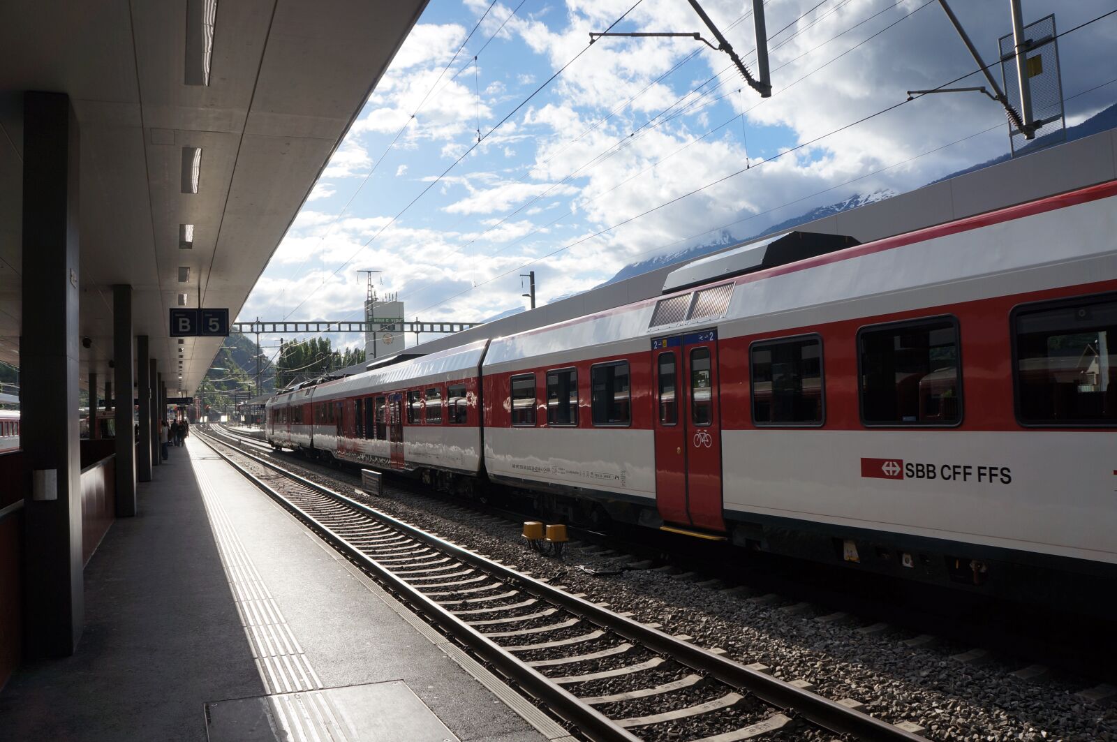 Sony Alpha NEX-5N + Sony E 18-55mm F3.5-5.6 OSS sample photo. Switzerland, train, station photography