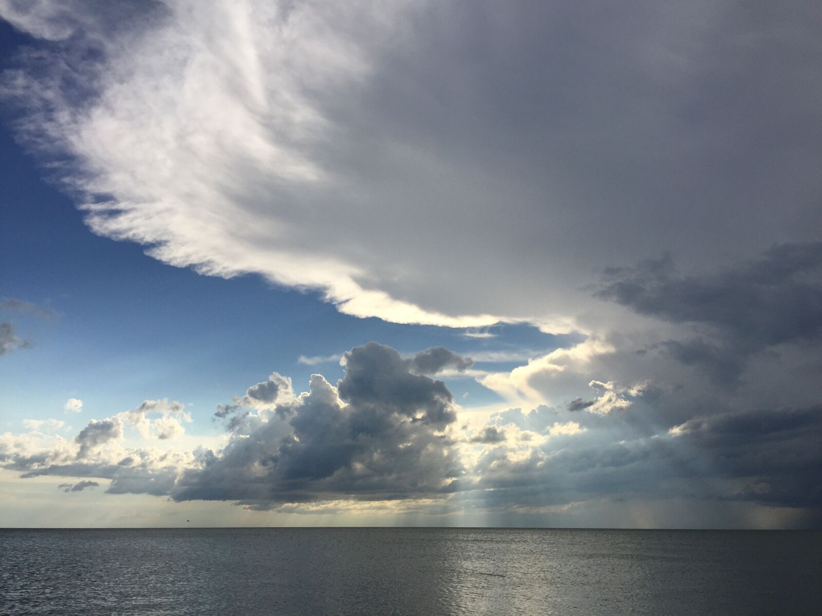iPhone 6 Plus back camera 4.15mm f/2.2 sample photo. Clouds, lake, storm photography