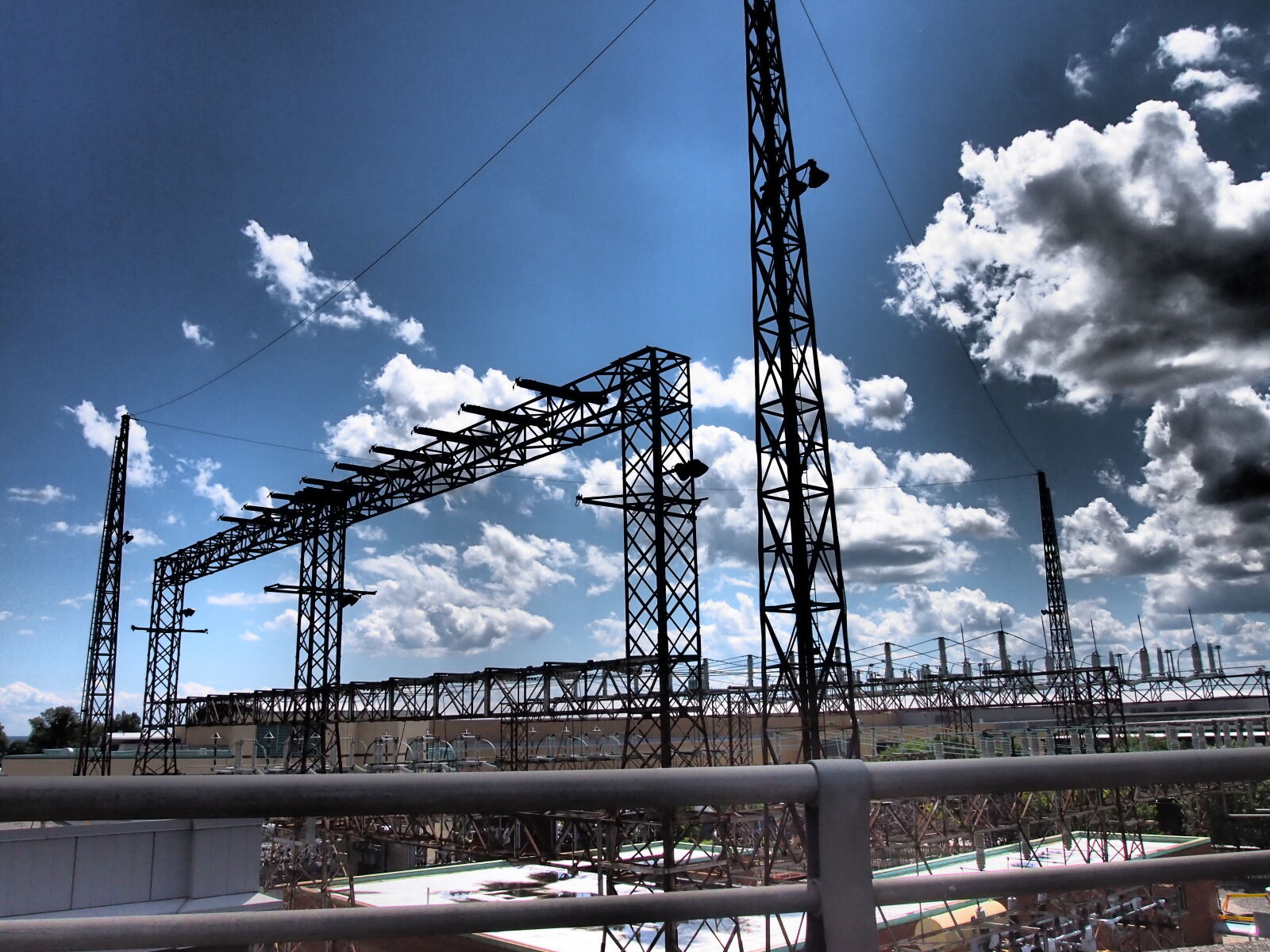 Olympus PEN E-PM1 sample photo. Clouds, electricity, industrial, sky photography