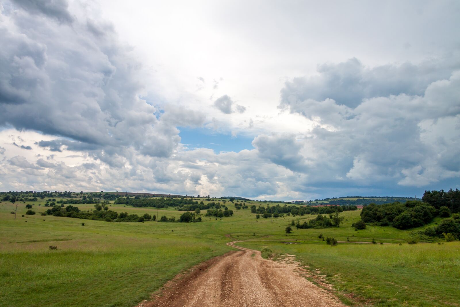 Canon EF-S 17-85mm F4-5.6 IS USM sample photo. Sky, clouds, road photography