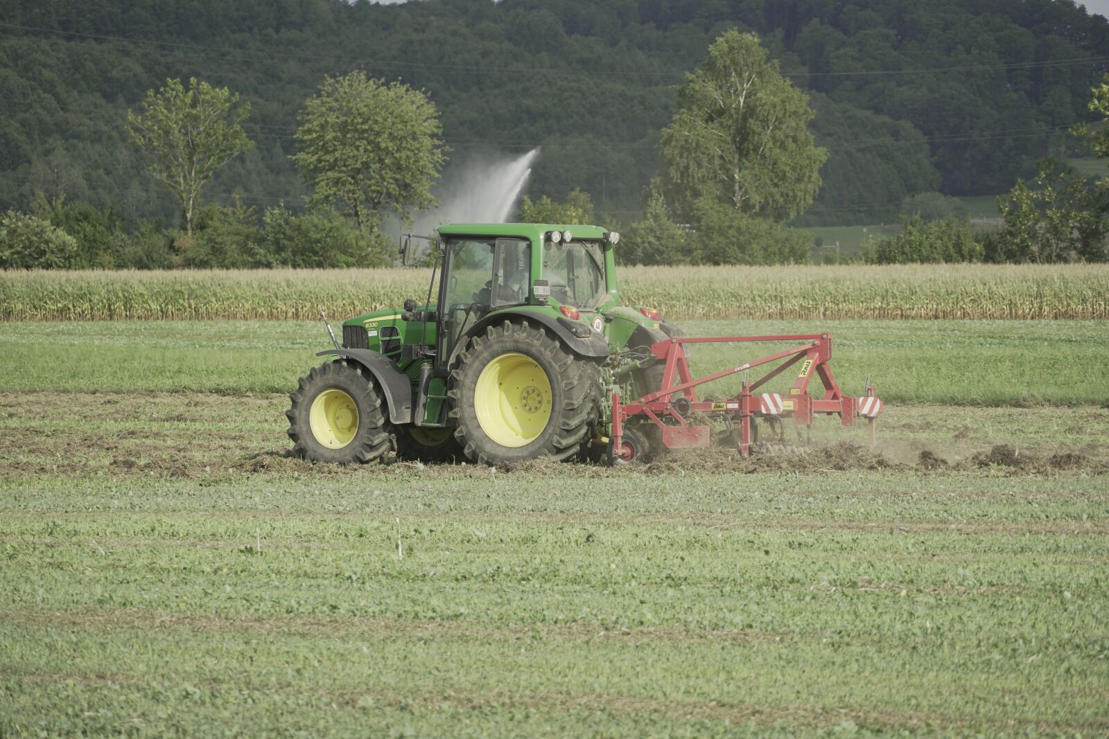Sony E 18-135mm F3.5-5.6 OSS sample photo. Agriculture, tractor, machine photography