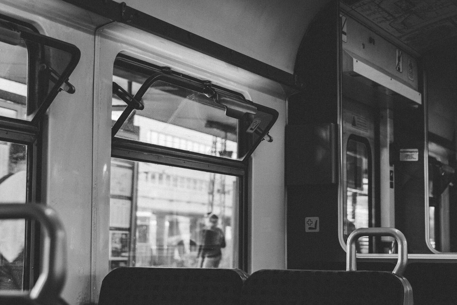 Nikon D7500 sample photo. Train, window, b w photography