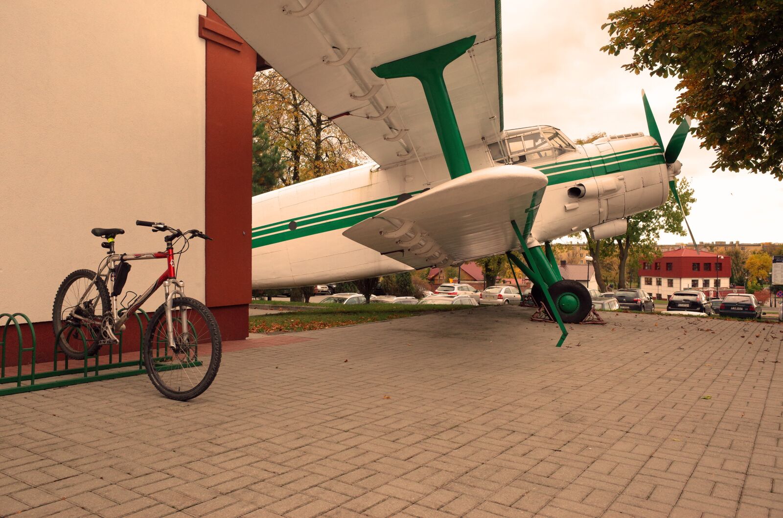 Ricoh GR II sample photo. Parking, bike, the plane photography