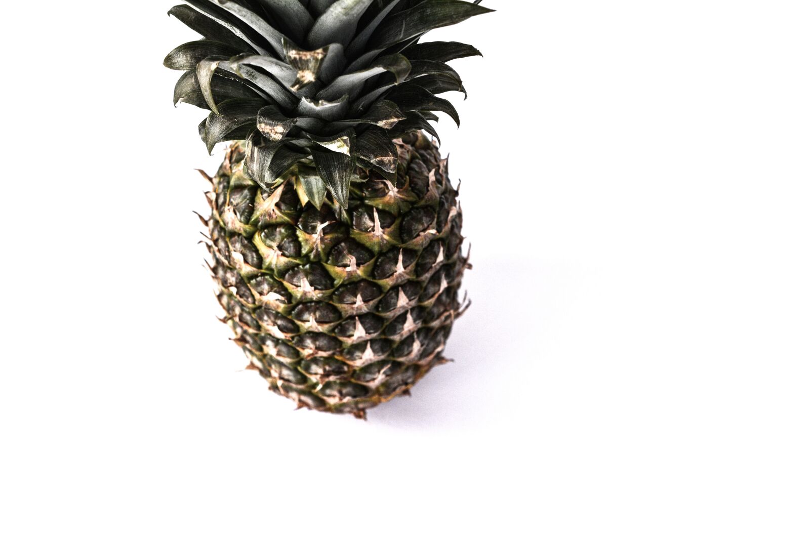 Nikon D5200 sample photo. Pineapple, white background, fruit photography