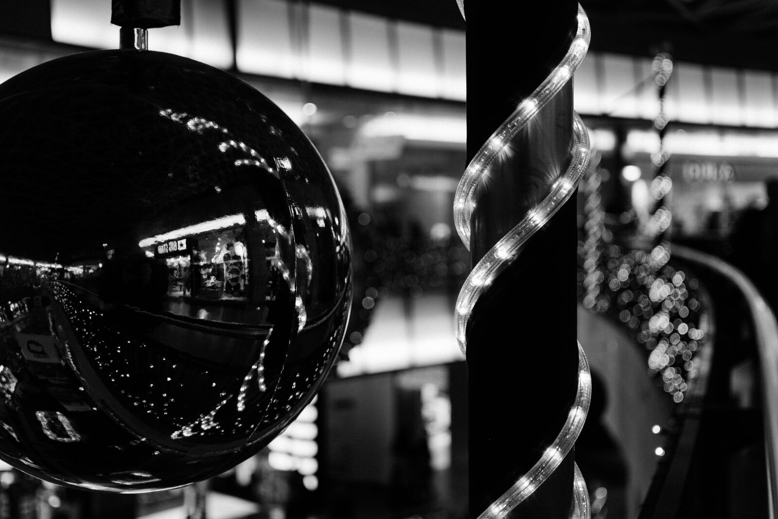 Sony a6000 + Sigma 30mm F2.8 EX DN sample photo. Bauble, bw, lights, mono photography