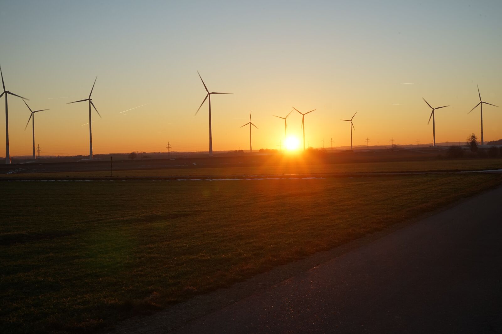Sony a7 sample photo. Sunset, windmills, wind power photography