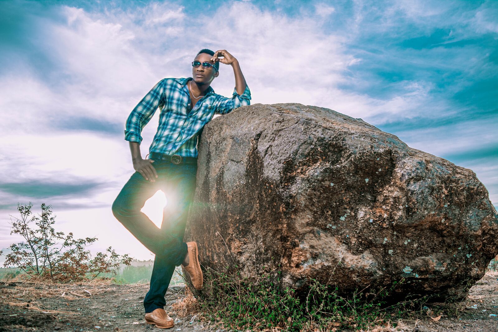 Nikon D5200 sample photo. Man, black skin, stone photography