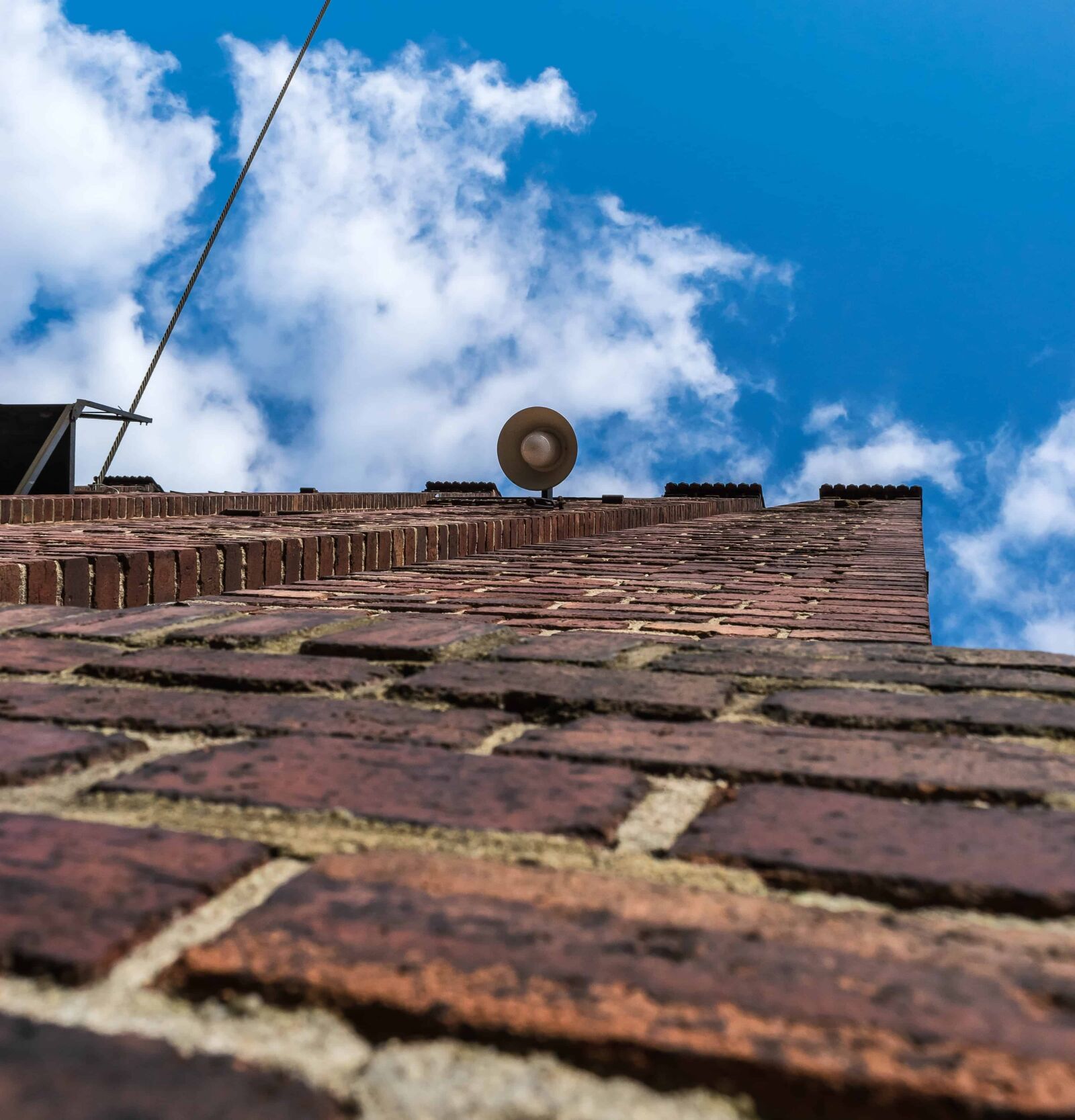 Nikon D3300 sample photo. Blue sky, brick wall photography