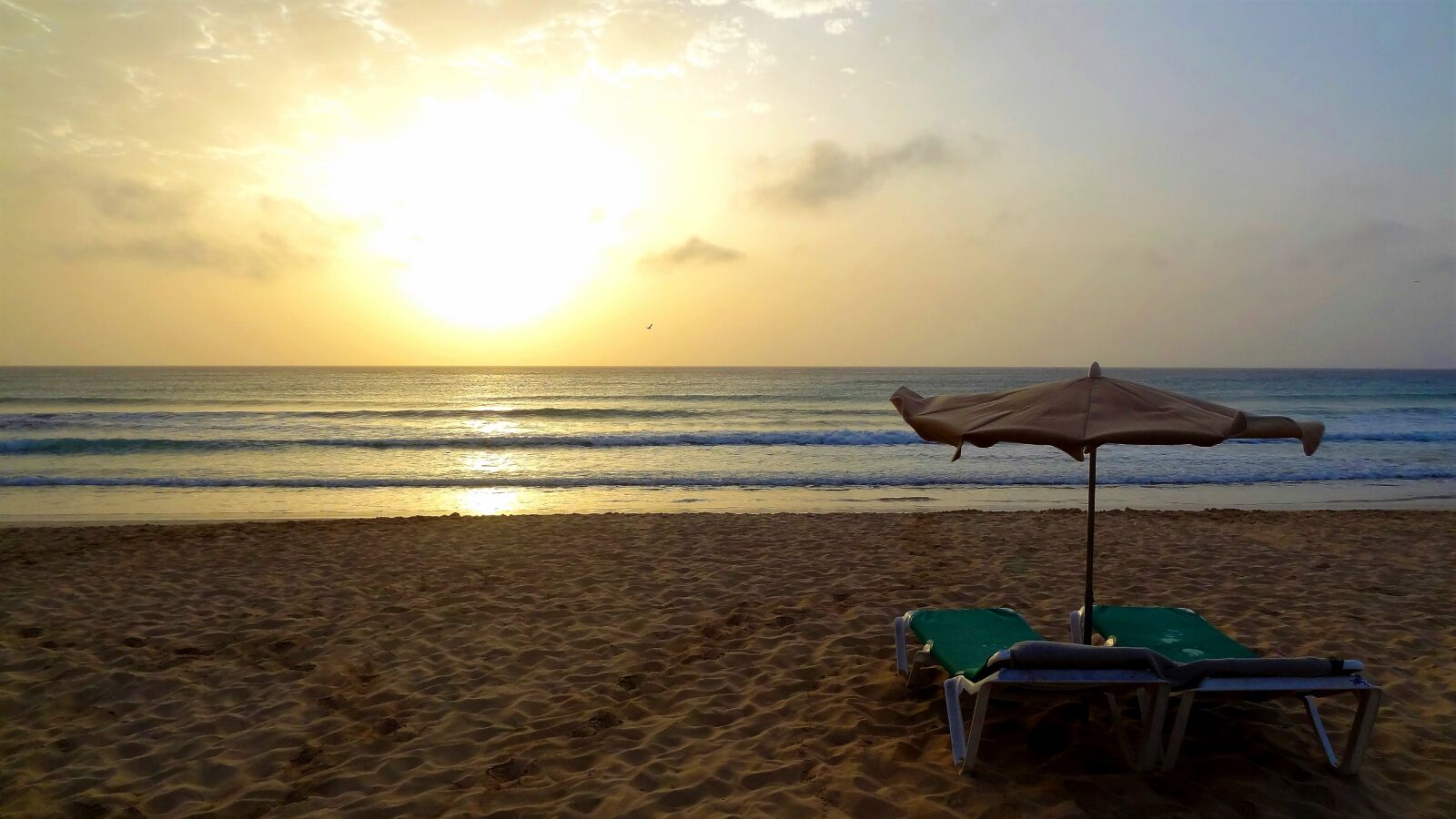Sony Cyber-shot DSC-HX9V sample photo. Sunrise, beach, sun loungers photography
