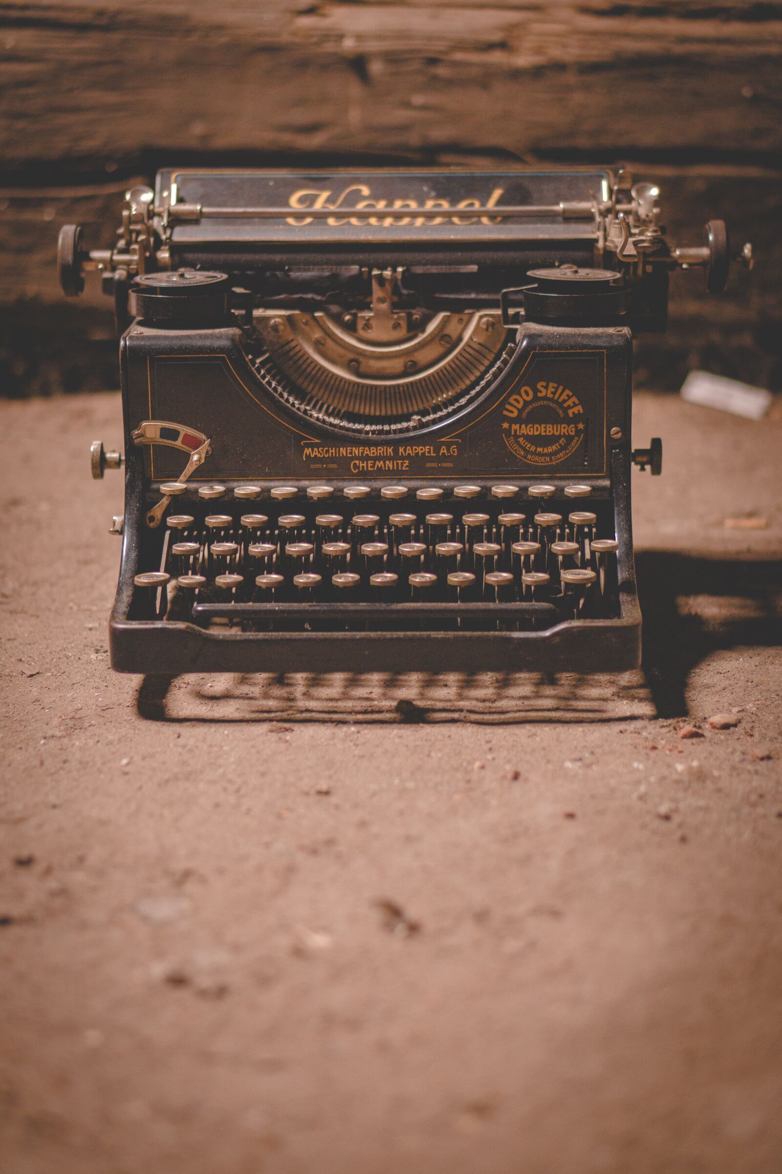 E 50mm F1.8 OSS sample photo. Typewriter, writing, text photography